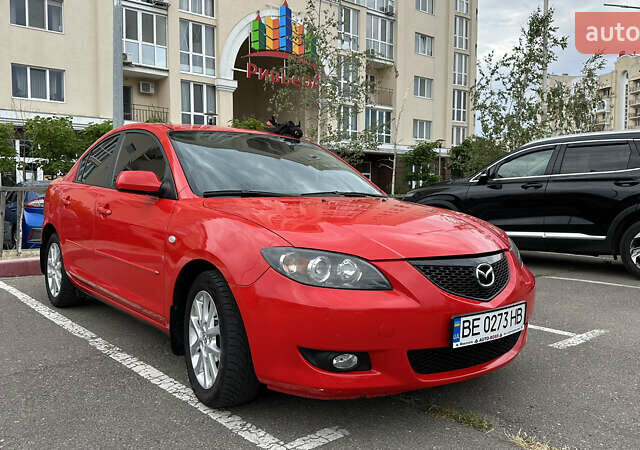 Красный Мазда 3, объемом двигателя 1.6 л и пробегом 129 тыс. км за 5800 $, фото 1 на Automoto.ua