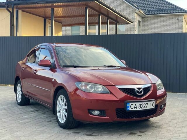 Красный Мазда 3, объемом двигателя 2 л и пробегом 220 тыс. км за 6700 $, фото 1 на Automoto.ua