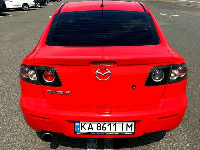 Красный Мазда 3, объемом двигателя 1.6 л и пробегом 130 тыс. км за 6500 $, фото 1 на Automoto.ua
