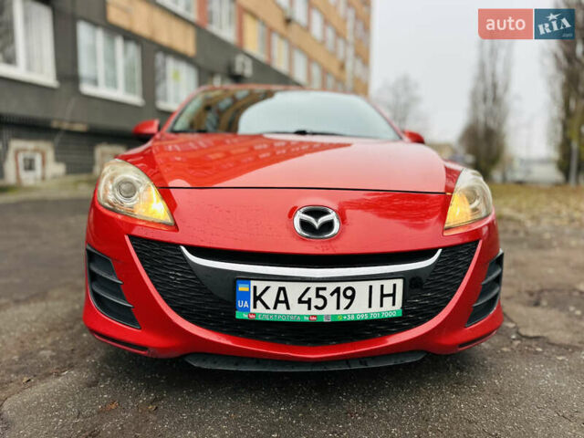 Красный Мазда 3, объемом двигателя 2 л и пробегом 199 тыс. км за 6800 $, фото 1 на Automoto.ua