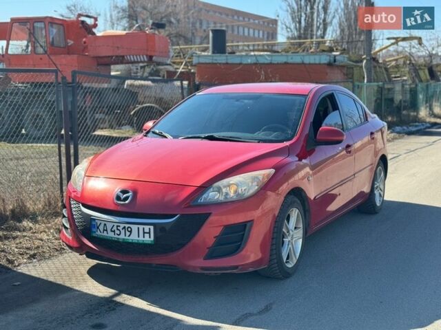 Красный Мазда 3, объемом двигателя 2 л и пробегом 200 тыс. км за 5700 $, фото 1 на Automoto.ua