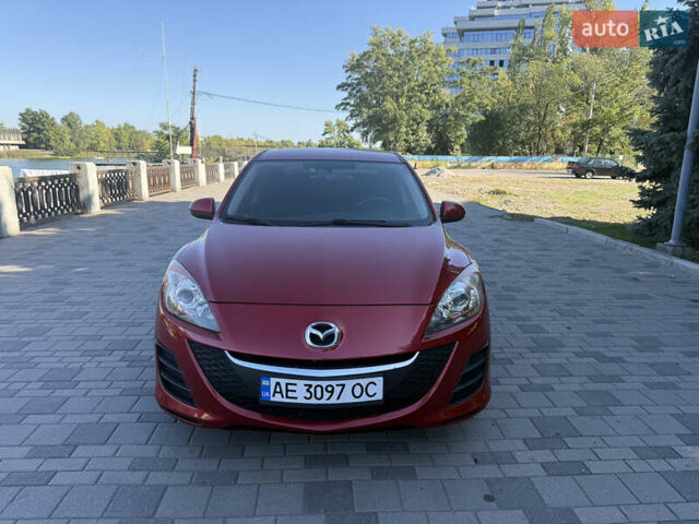 Красный Мазда 3, объемом двигателя 2 л и пробегом 225 тыс. км за 7700 $, фото 1 на Automoto.ua