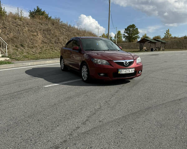 Красный Мазда 3, объемом двигателя 1.6 л и пробегом 380 тыс. км за 6000 $, фото 1 на Automoto.ua