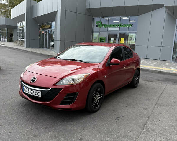 Красный Мазда 3, объемом двигателя 2 л и пробегом 217 тыс. км за 6699 $, фото 1 на Automoto.ua