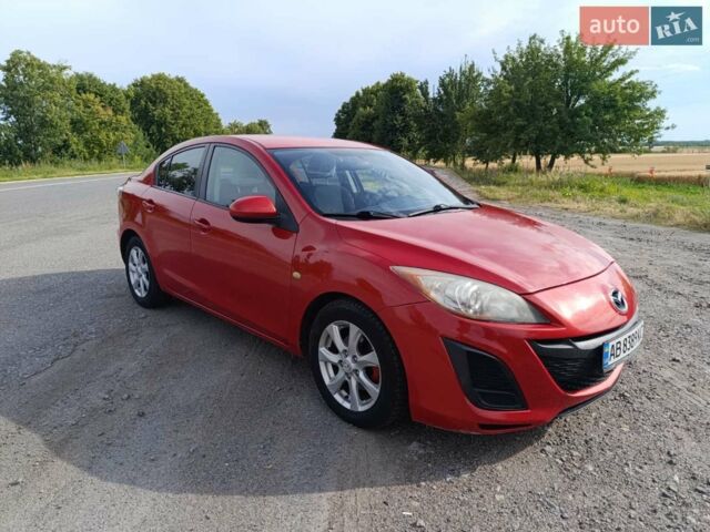 Красный Мазда 3, объемом двигателя 2 л и пробегом 161 тыс. км за 6600 $, фото 1 на Automoto.ua