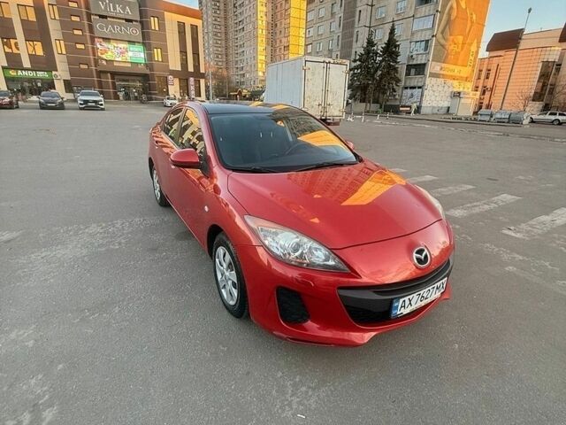 Красный Мазда 3, объемом двигателя 1.6 л и пробегом 120 тыс. км за 9300 $, фото 1 на Automoto.ua