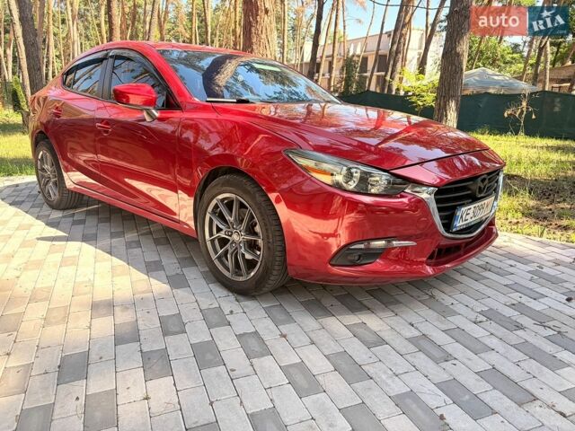 Червоний Мазда 3, об'ємом двигуна 2 л та пробігом 150 тис. км за 9500 $, фото 1 на Automoto.ua