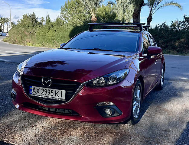 Красный Мазда 3, объемом двигателя 2 л и пробегом 55 тыс. км за 11500 $, фото 1 на Automoto.ua