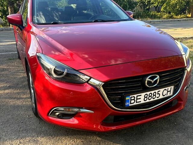 Красный Мазда 3, объемом двигателя 2 л и пробегом 83 тыс. км за 12600 $, фото 1 на Automoto.ua