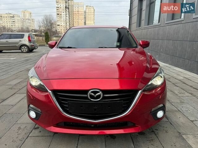 Красный Мазда 3, объемом двигателя 1.5 л и пробегом 145 тыс. км за 13999 $, фото 1 на Automoto.ua