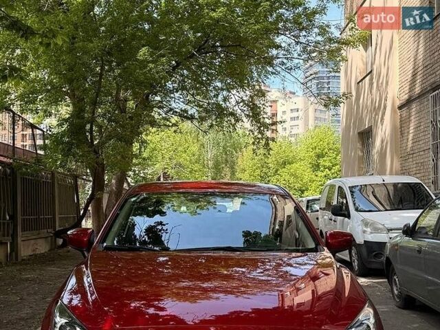 Красный Мазда 3, объемом двигателя 1.5 л и пробегом 58 тыс. км за 14400 $, фото 1 на Automoto.ua