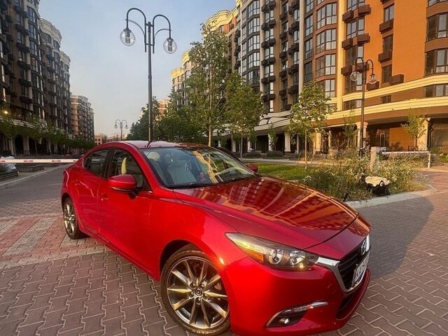 Красный Мазда 3, объемом двигателя 2.49 л и пробегом 106 тыс. км за 14800 $, фото 1 на Automoto.ua