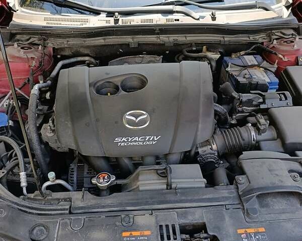 Красный Мазда 3, объемом двигателя 2 л и пробегом 135 тыс. км за 12800 $, фото 1 на Automoto.ua
