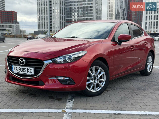 Красный Мазда 3, объемом двигателя 1.5 л и пробегом 56 тыс. км за 15799 $, фото 1 на Automoto.ua