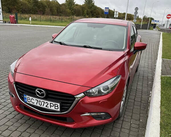 Красный Мазда 3, объемом двигателя 1.5 л и пробегом 121 тыс. км за 13500 $, фото 1 на Automoto.ua