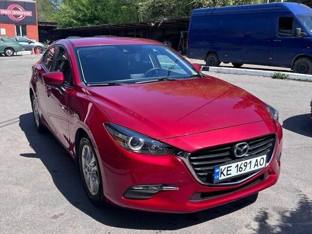 Красный Мазда 3, объемом двигателя 2 л и пробегом 78 тыс. км за 13200 $, фото 1 на Automoto.ua