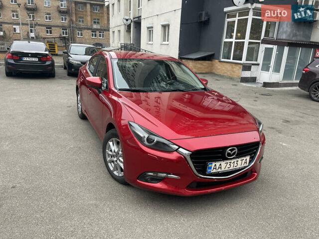 Красный Мазда 3, объемом двигателя 1.5 л и пробегом 125 тыс. км за 13600 $, фото 1 на Automoto.ua