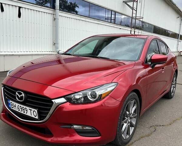 Красный Мазда 3, объемом двигателя 2.5 л и пробегом 105 тыс. км за 13500 $, фото 1 на Automoto.ua