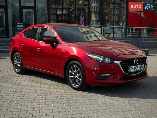 Красный Мазда 3, объемом двигателя 2.5 л и пробегом 70 тыс. км за 13800 $, фото 1 на Automoto.ua
