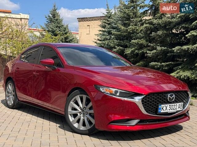 Красный Мазда 3, объемом двигателя 2.49 л и пробегом 113 тыс. км за 15300 $, фото 1 на Automoto.ua