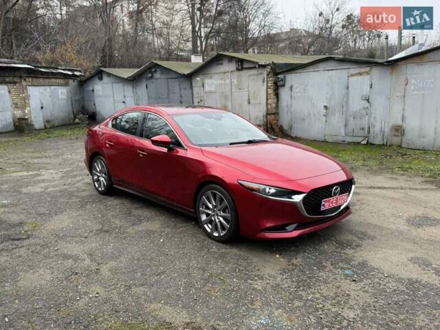 Красный Мазда 3, объемом двигателя 2.49 л и пробегом 101 тыс. км за 15900 $, фото 1 на Automoto.ua