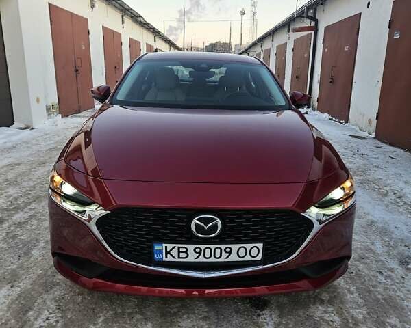 Красный Мазда 3, объемом двигателя 2.49 л и пробегом 42 тыс. км за 15900 $, фото 1 на Automoto.ua