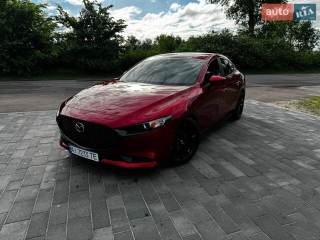 Красный Мазда 3, объемом двигателя 2.49 л и пробегом 97 тыс. км за 18800 $, фото 1 на Automoto.ua
