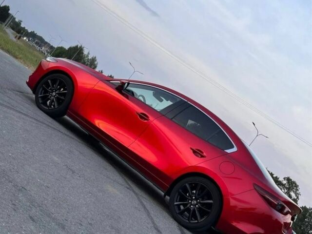 Красный Мазда 3, объемом двигателя 2.5 л и пробегом 69 тыс. км за 9800 $, фото 1 на Automoto.ua