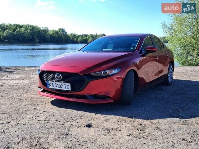 Красный Мазда 3, объемом двигателя 2.49 л и пробегом 126 тыс. км за 15500 $, фото 1 на Automoto.ua