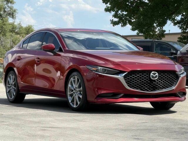 Красный Мазда 3, объемом двигателя 2.5 л и пробегом 19 тыс. км за 14000 $, фото 1 на Automoto.ua