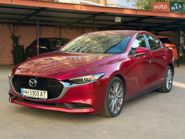 Красный Мазда 3, объемом двигателя 2.49 л и пробегом 43 тыс. км за 17700 $, фото 1 на Automoto.ua