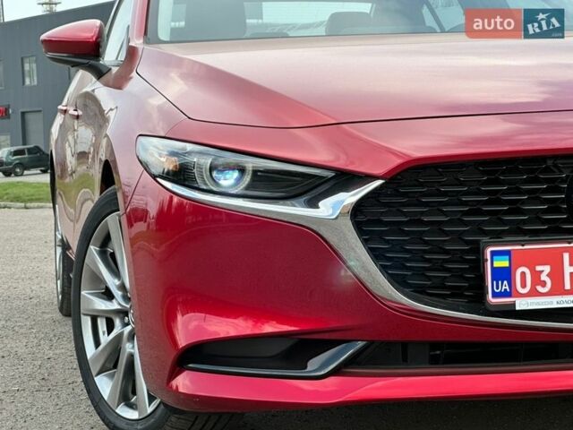 Красный Мазда 3, объемом двигателя 2.49 л и пробегом 11 тыс. км за 19888 $, фото 1 на Automoto.ua