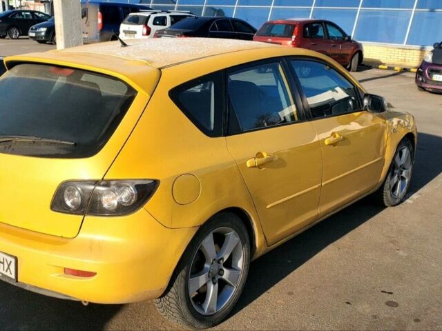 Желтый Мазда 3, объемом двигателя 2 л и пробегом 270 тыс. км за 4000 $, фото 1 на Automoto.ua