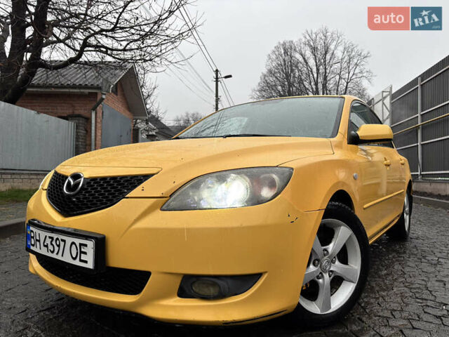 Желтый Мазда 3, объемом двигателя 1.6 л и пробегом 200 тыс. км за 3400 $, фото 1 на Automoto.ua