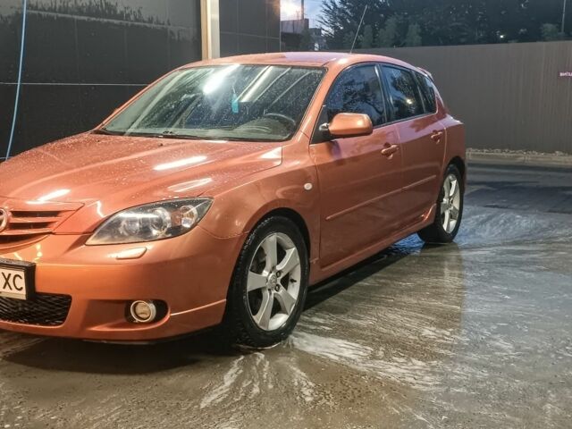 Желтый Мазда 3, объемом двигателя 2 л и пробегом 230 тыс. км за 3800 $, фото 1 на Automoto.ua