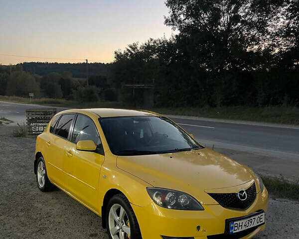 Желтый Мазда 3, объемом двигателя 1.6 л и пробегом 200 тыс. км за 2900 $, фото 1 на Automoto.ua