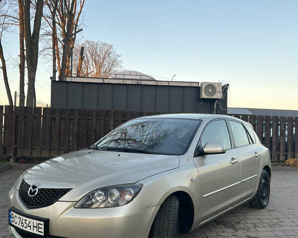 Жовтий Мазда 3, об'ємом двигуна 1.56 л та пробігом 190 тис. км за 3399 $, фото 1 на Automoto.ua