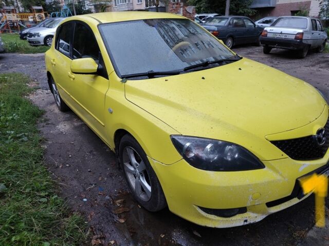 Жовтий Мазда 3, об'ємом двигуна 2 л та пробігом 254 тис. км за 4199 $, фото 1 на Automoto.ua