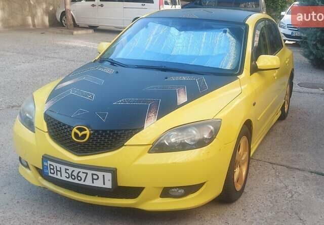 Жовтий Мазда 3, об'ємом двигуна 1.6 л та пробігом 203 тис. км за 5500 $, фото 1 на Automoto.ua