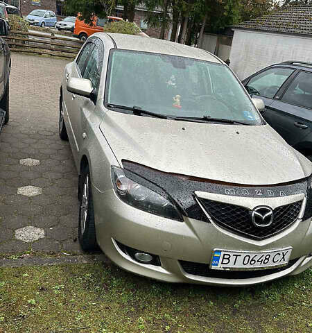 Желтый Мазда 3, объемом двигателя 1.6 л и пробегом 140 тыс. км за 6500 $, фото 1 на Automoto.ua