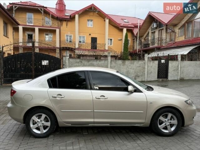 Желтый Мазда 3, объемом двигателя 1.6 л и пробегом 300 тыс. км за 4300 $, фото 1 на Automoto.ua