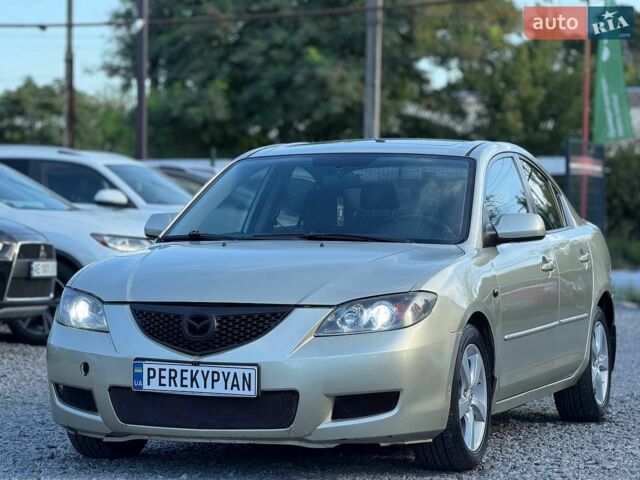 Желтый Мазда 3, объемом двигателя 1.6 л и пробегом 298 тыс. км за 3800 $, фото 1 на Automoto.ua