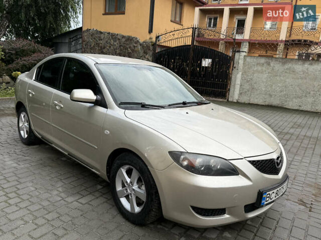Желтый Мазда 3, объемом двигателя 1.6 л и пробегом 352 тыс. км за 4300 $, фото 1 на Automoto.ua