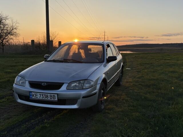 Серый Мазда 3, объемом двигателя 2 л и пробегом 250 тыс. км за 600 $, фото 1 на Automoto.ua