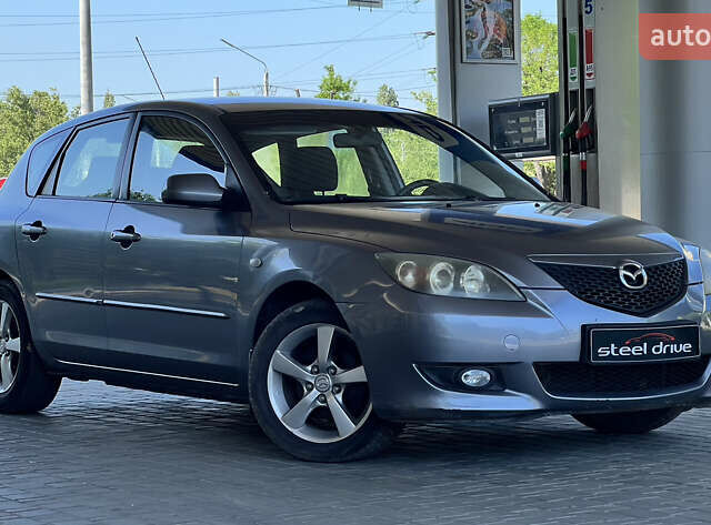 Серый Мазда 3, объемом двигателя 1.6 л и пробегом 237 тыс. км за 3850 $, фото 1 на Automoto.ua