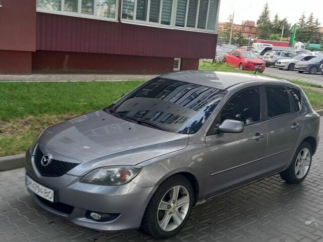 Серый Мазда 3, объемом двигателя 1.6 л и пробегом 252 тыс. км за 2899 $, фото 1 на Automoto.ua