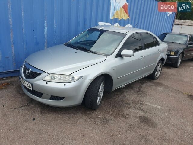 Серый Мазда 3, объемом двигателя 2 л и пробегом 250 тыс. км за 1500 $, фото 1 на Automoto.ua