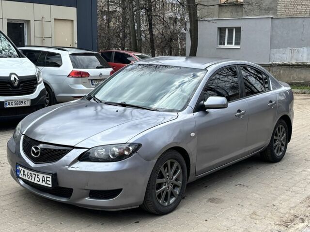 Серый Мазда 3, объемом двигателя 1.6 л и пробегом 246 тыс. км за 2900 $, фото 1 на Automoto.ua