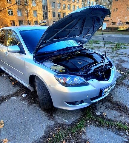Серый Мазда 3, объемом двигателя 2 л и пробегом 230 тыс. км за 4700 $, фото 1 на Automoto.ua