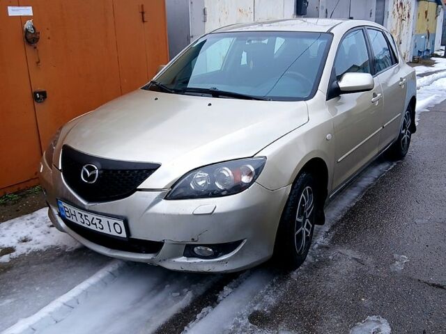 Серый Мазда 3, объемом двигателя 1.6 л и пробегом 338 тыс. км за 3000 $, фото 1 на Automoto.ua
